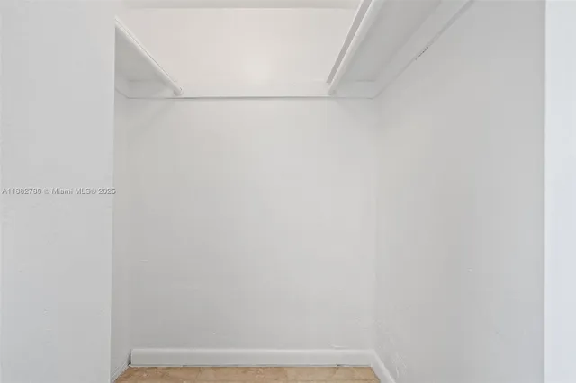 a view of a balcony with furniture