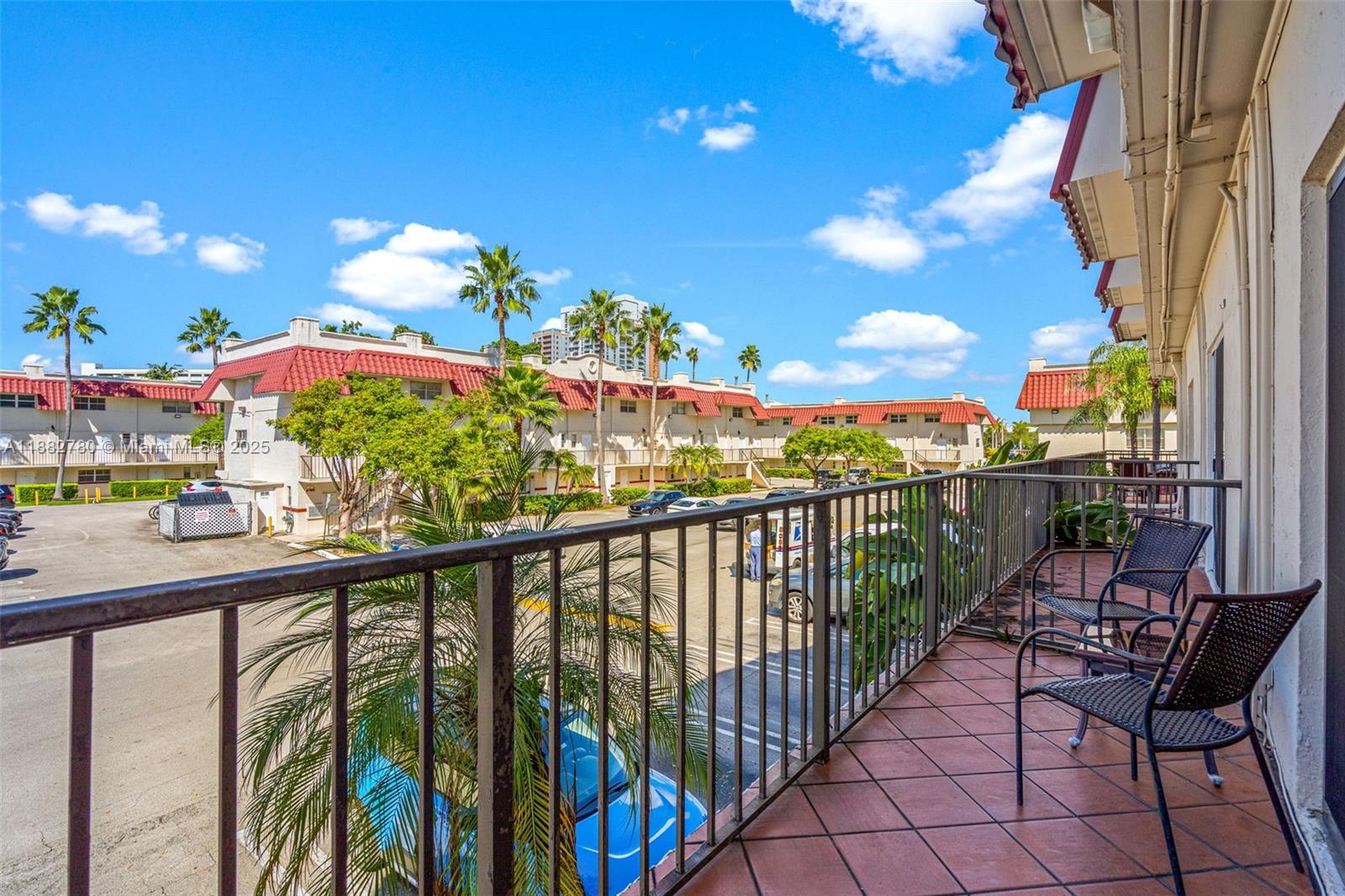 8650 Southwest 67th Avenue, Unit 1027 Pinecrest, FL 33156 - Photo 26 of 41 a view of a balcony with furniture