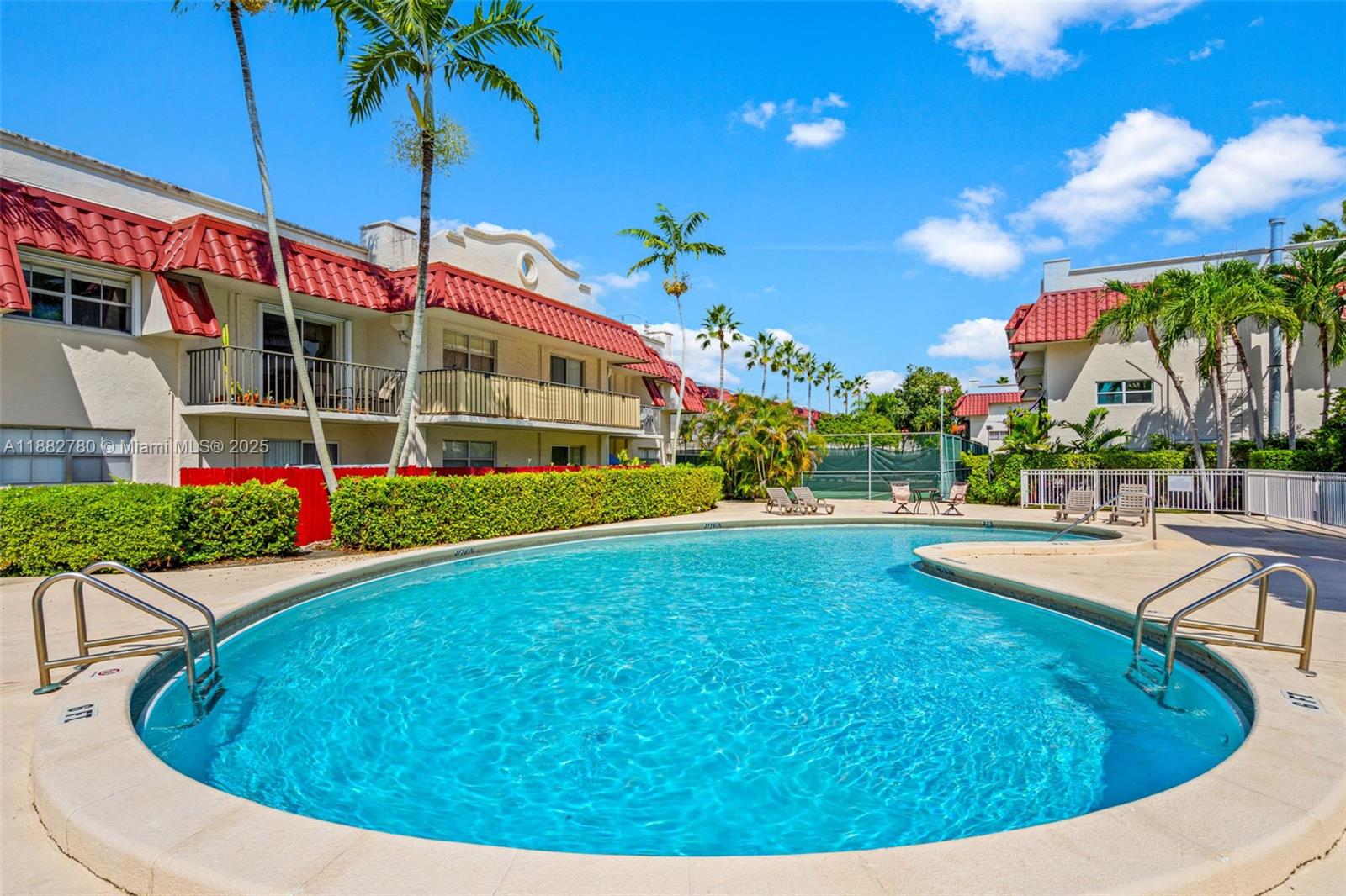 8650 Southwest 67th Avenue, Unit 1027 Pinecrest, FL 33156 - Photo 32 of 41 a view of swimming pool with a patio