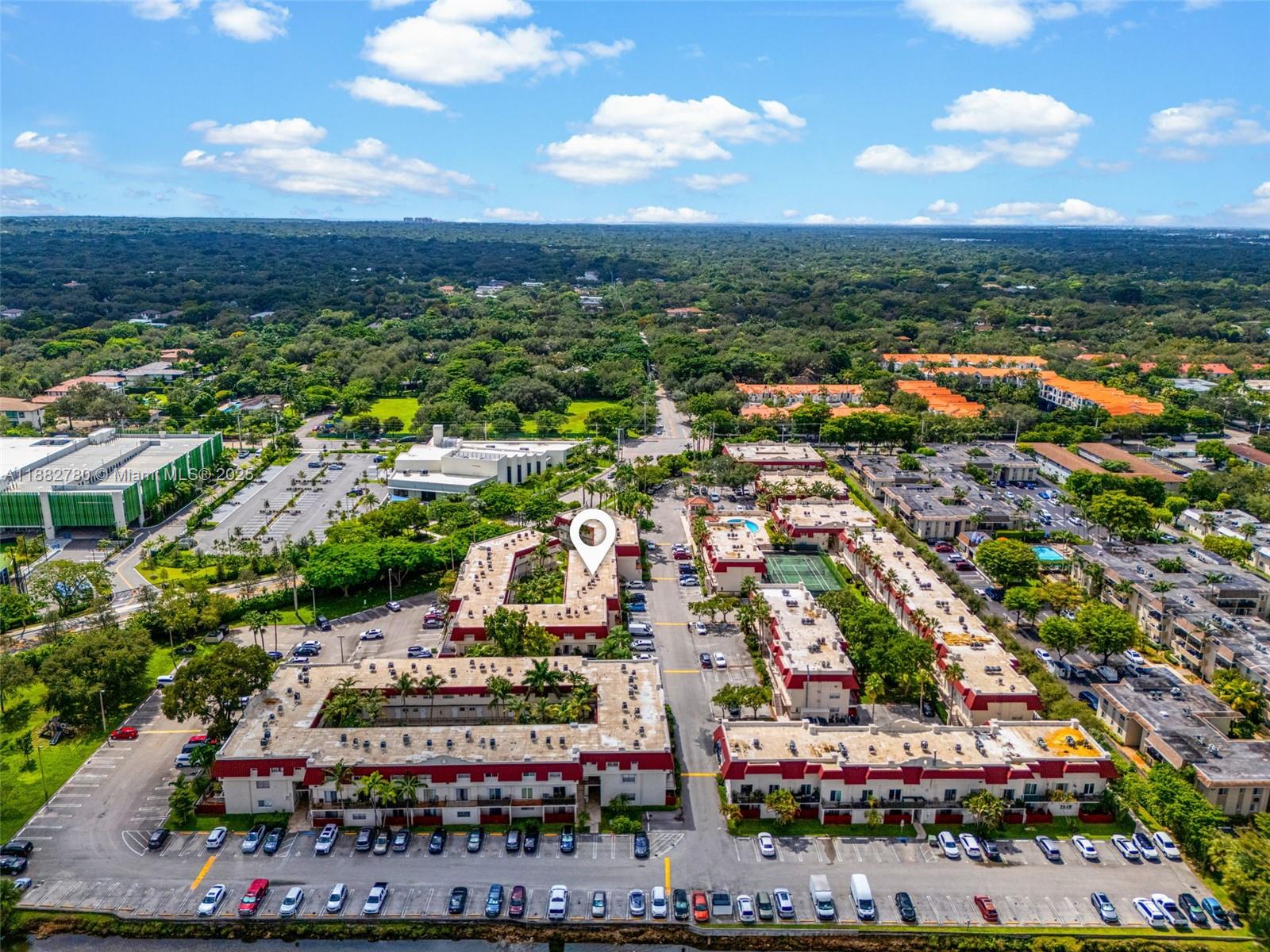 8650 Southwest 67th Avenue, Unit 1027 Pinecrest, FL 33156 - Photo 37 of 41 an aerial view of a city