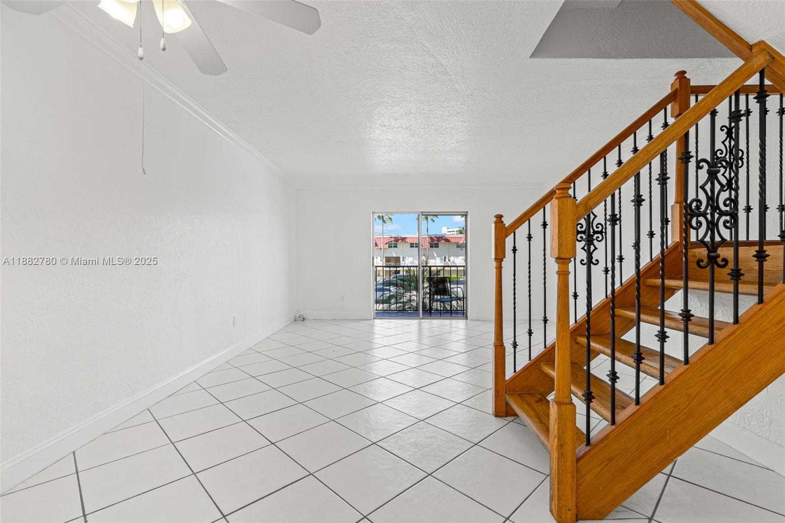 8650 Southwest 67th Avenue, Unit 1027 Pinecrest, FL 33156 - Photo 8 of 41 a view of an entryway with wooden floor