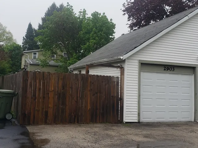 a house with trees in the background
