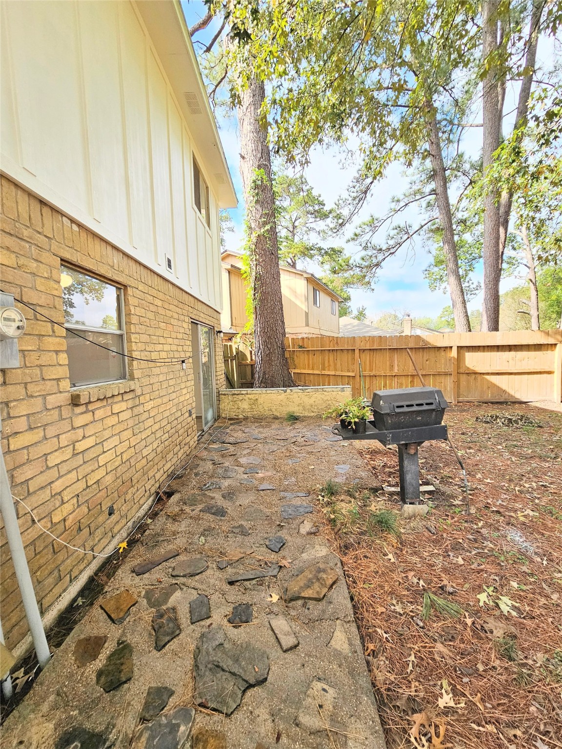 24022 Spring Briar Lane Spring, TX 77373 - Photo 28 of 34 a view of a blue house with yard and sitting area