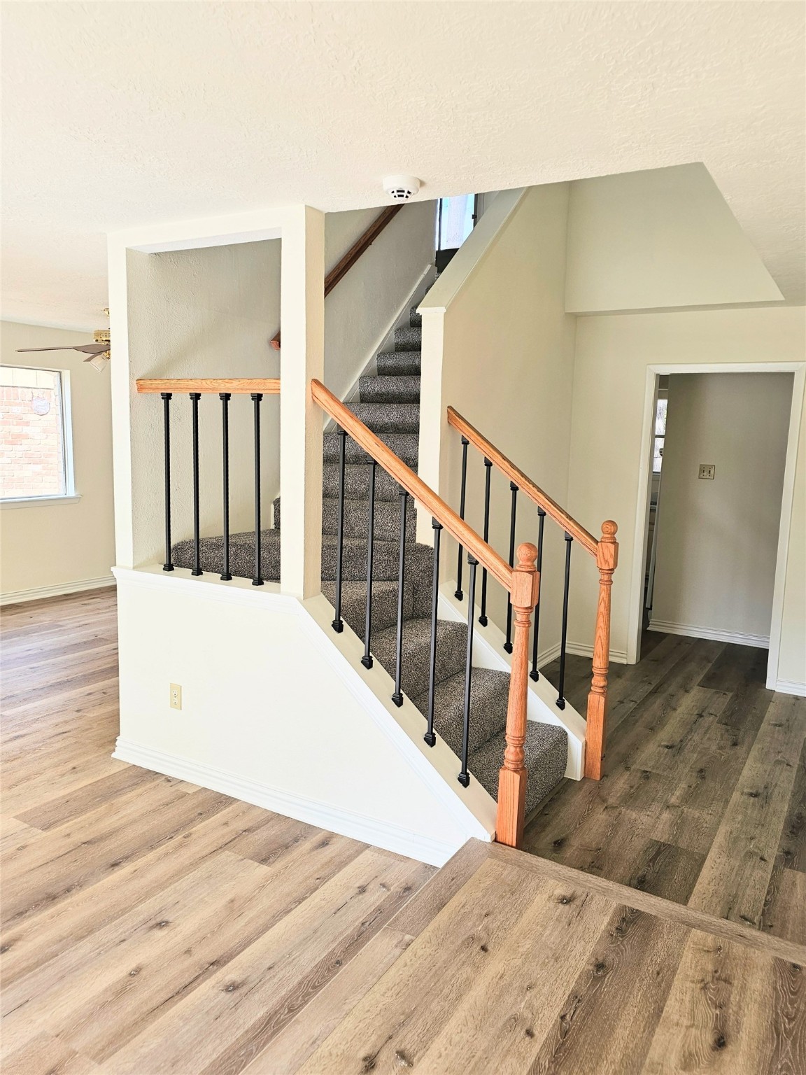 24022 Spring Briar Lane Spring, TX 77373 - Photo 3 of 34 Walk into open living space with upgraded stairwell. All new floors and paint.