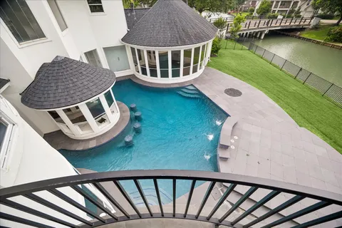 a view of balcony with yard