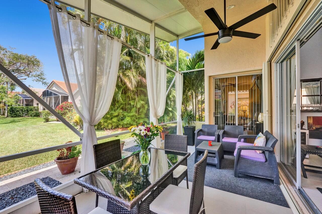 11067 Springbrook Circle Boynton Beach, FL 33437 - Photo 40 of 50 a outdoor living space with furniture