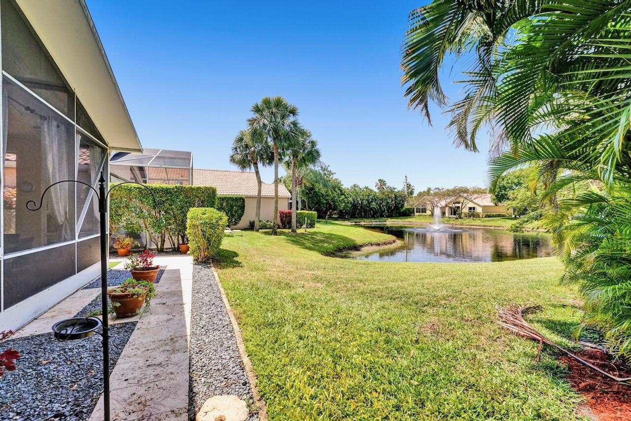 11067 Springbrook Circle Boynton Beach, FL 33437 - Photo 43 of 50 a view of a swimming pool with a patio