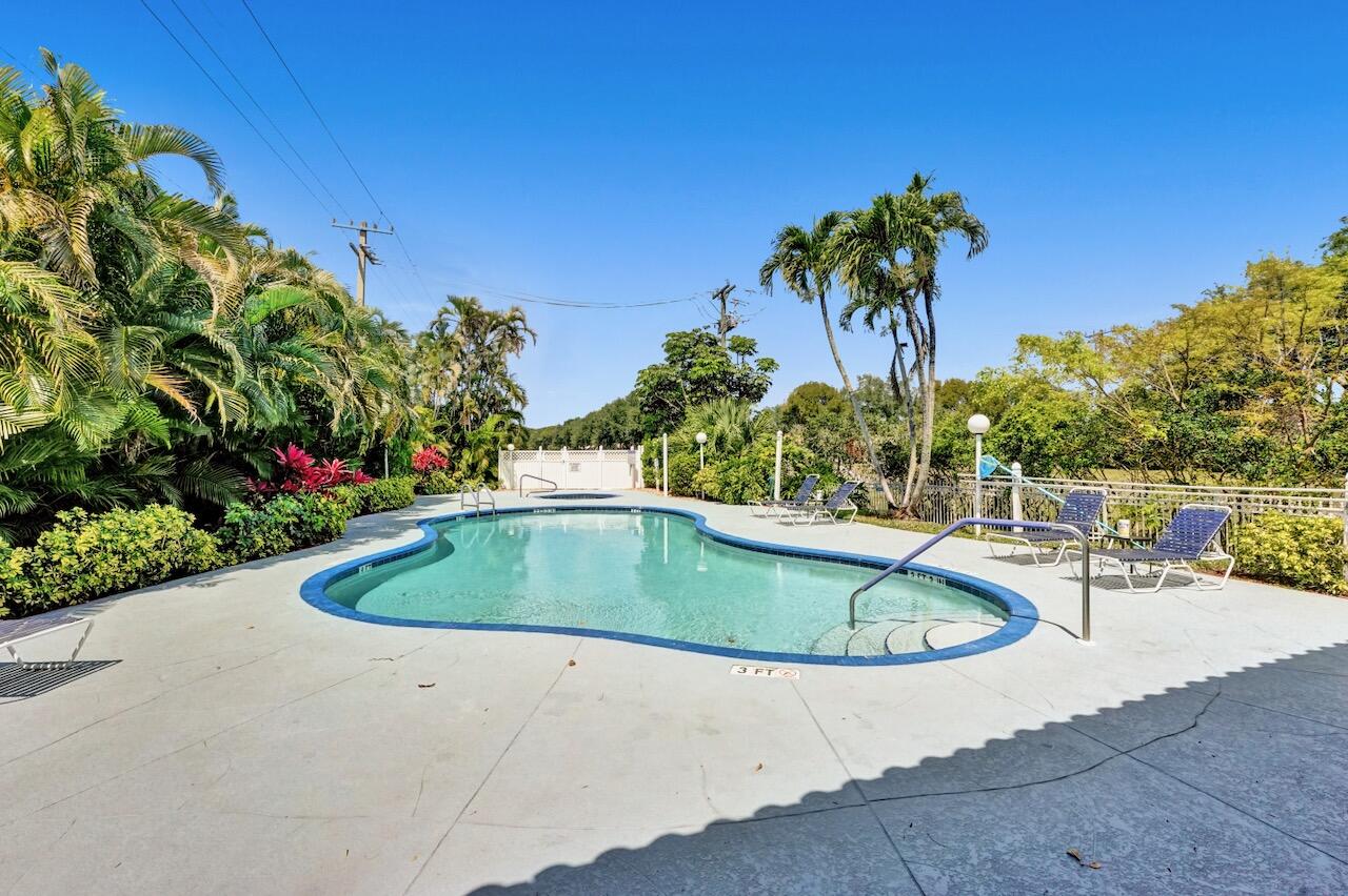 11067 Springbrook Circle Boynton Beach, FL 33437 - Photo 49 of 50 a view of outdoor space and swimming pool