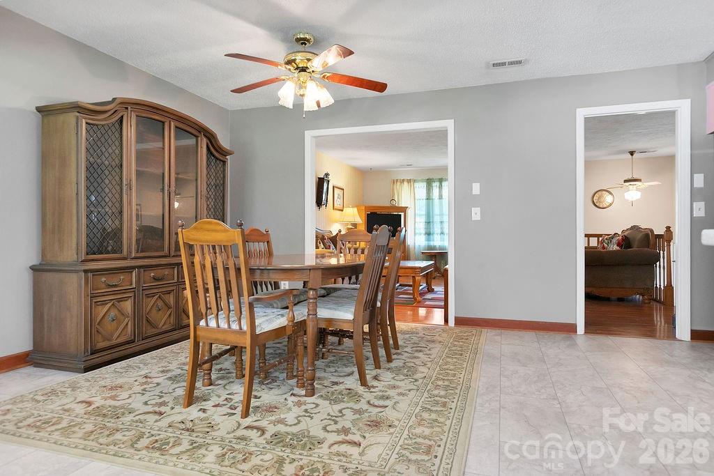 1482 Island Ford Road Brevard, NC 28712 - Photo 12 of 48 a dining room with furniture and window