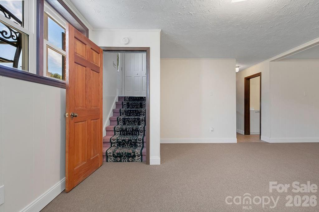 1482 Island Ford Road Brevard, NC 28712 - Photo 28 of 48 an empty room with shelves