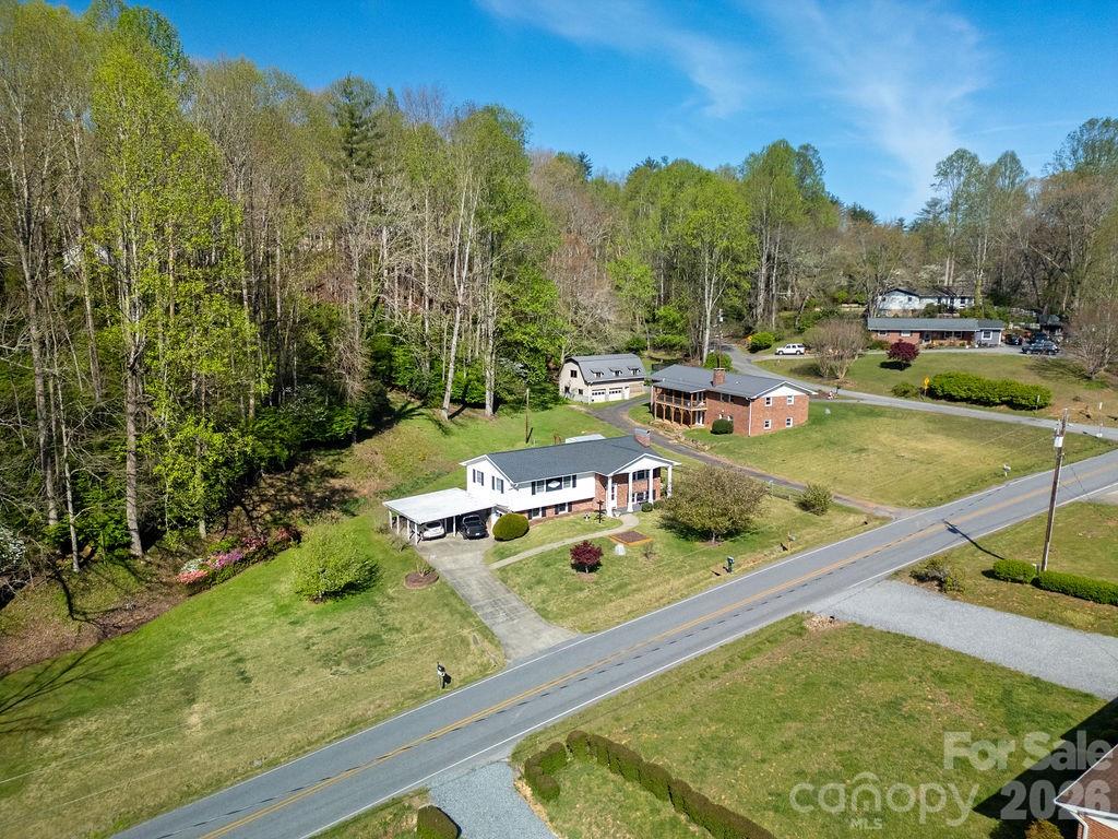 1482 Island Ford Road Brevard, NC 28712 - Photo 41 of 48 a view of a swimming pool with a yard