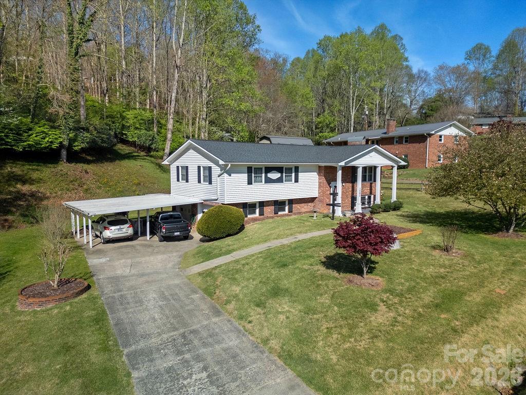 1482 Island Ford Road Brevard, NC 28712 - Photo 43 of 48 a view of a house with a yard and sitting area