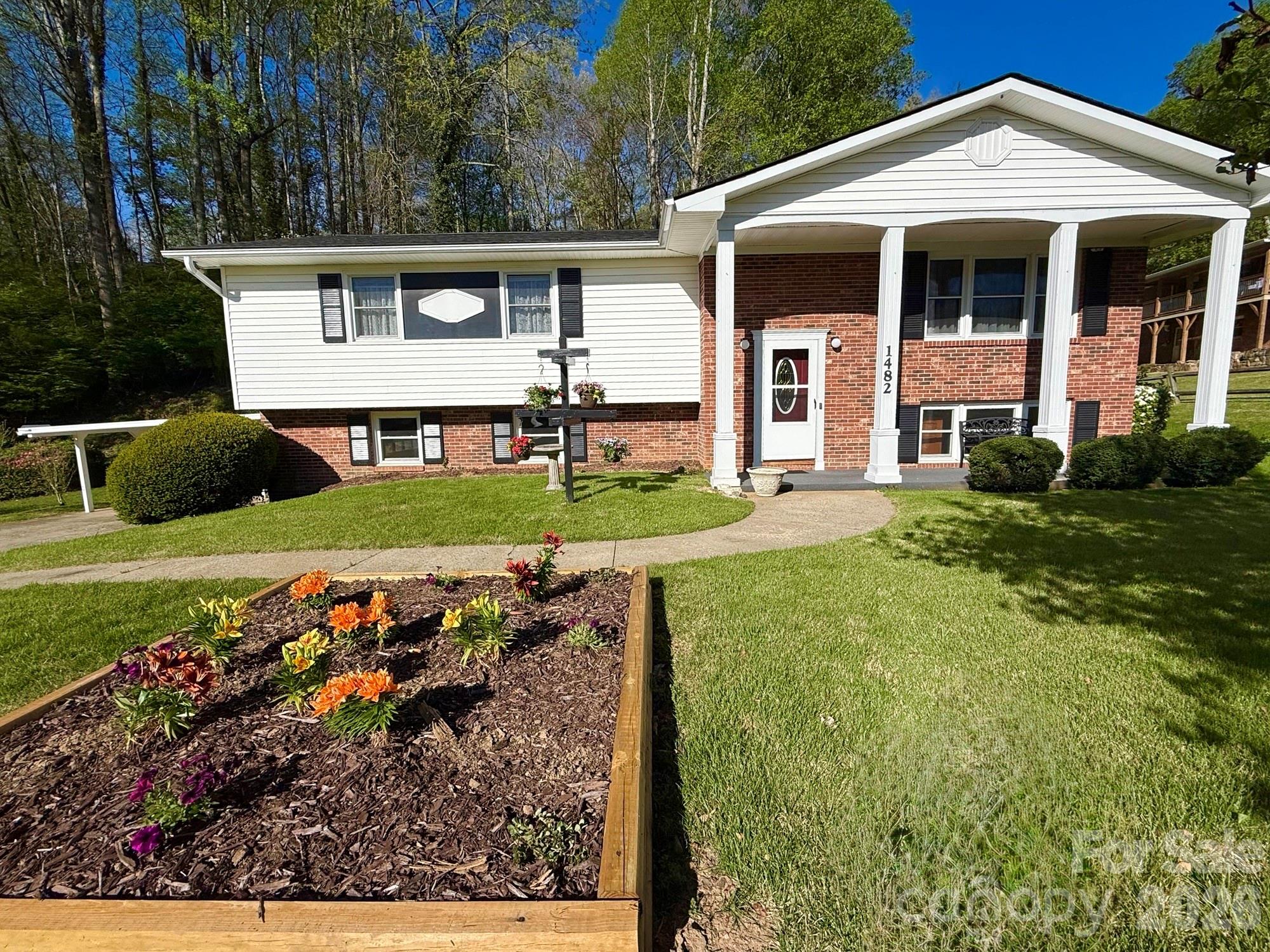 1482 Island Ford Road Brevard, NC 28712 - Photo 45 of 48 front view of a house with a yard