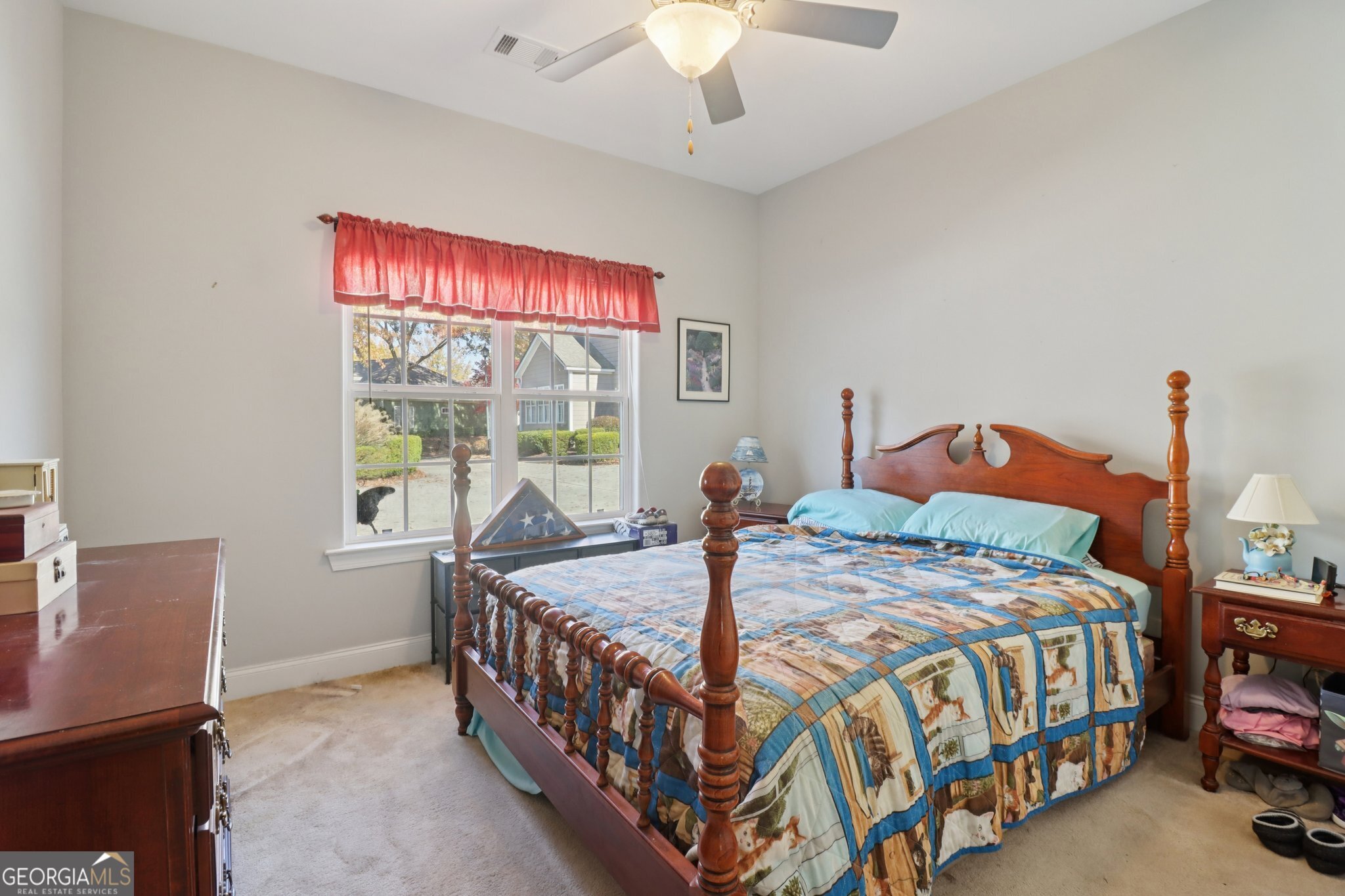 1502 Commonwealth Circle Newnan, GA 30263 - Photo 18 of 30 a bedroom with a bed and a window