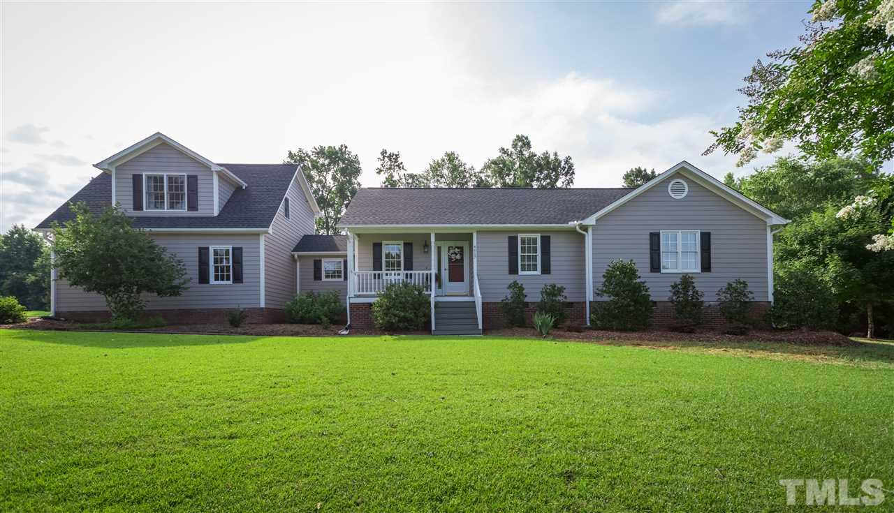 4017 Forty-Niner's Road Clayton, NC 27520 - Photo 1 of 25 Wonderful Ranch Home with Upstairs Bonus, Flex Room and Full Bath with Side-Entry Garage Sits on an Acre Lot