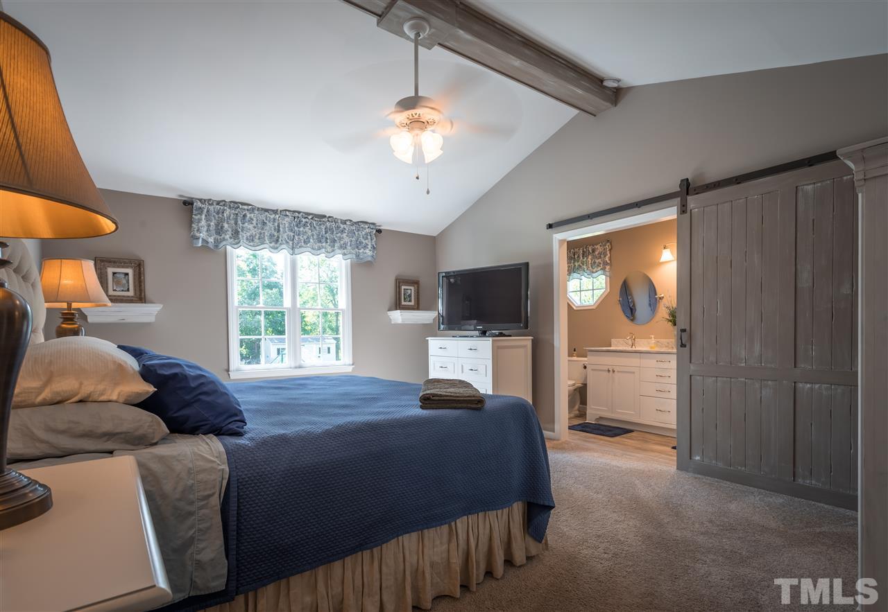 4017 Forty-Niner's Road Clayton, NC 27520 - Photo 12 of 25 Master Suite has Cathedral Ceiling with Custom Beam