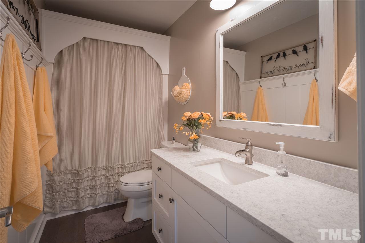 4017 Forty-Niner's Road Clayton, NC 27520 - Photo 16 of 25 Generous Updated Full Bath with Oversized Vanity