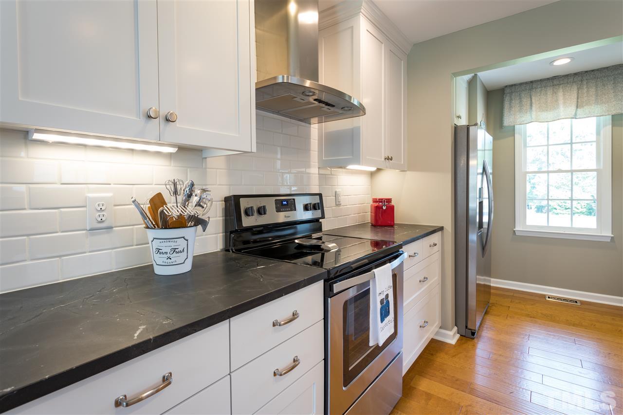 4017 Forty-Niner's Road Clayton, NC 27520 - Photo 6 of 25 Enjoy this Kitchen with Under Cabinet Lighting and Wonderful Drawer Space