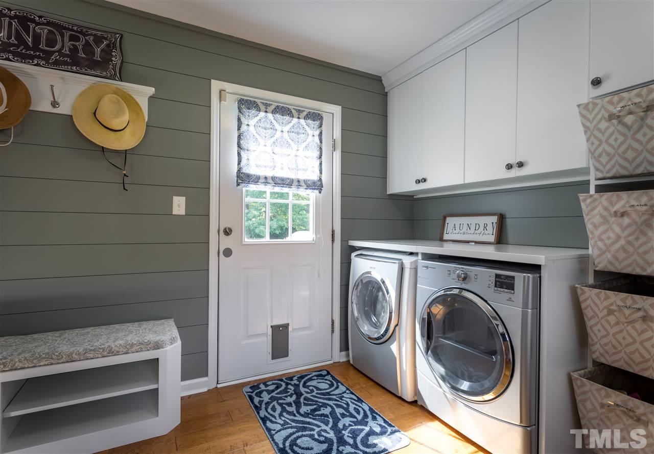 4017 Forty-Niner's Road Clayton, NC 27520 - Photo 9 of 25 Mudd Room offers Plenty of Room for Laundry and has Exterior Access to Small Deck and Access to Backstairs