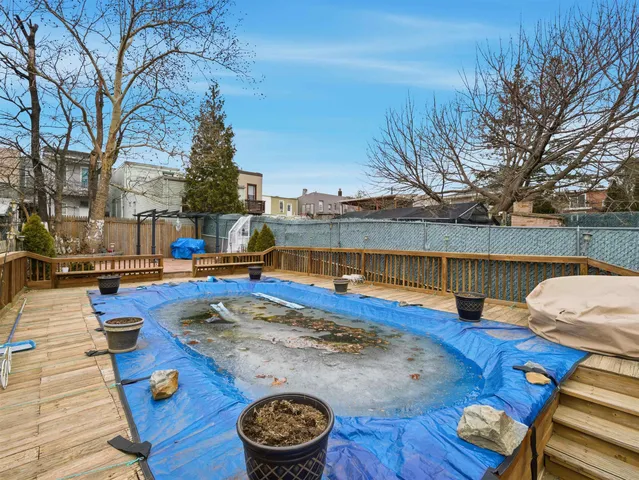 a view of a patio with swimming pool