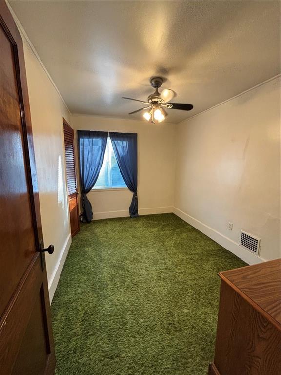 603 7th Avenue Coraopolis, PA 15108 - Photo 11 of 12 a view of an empty room with a window