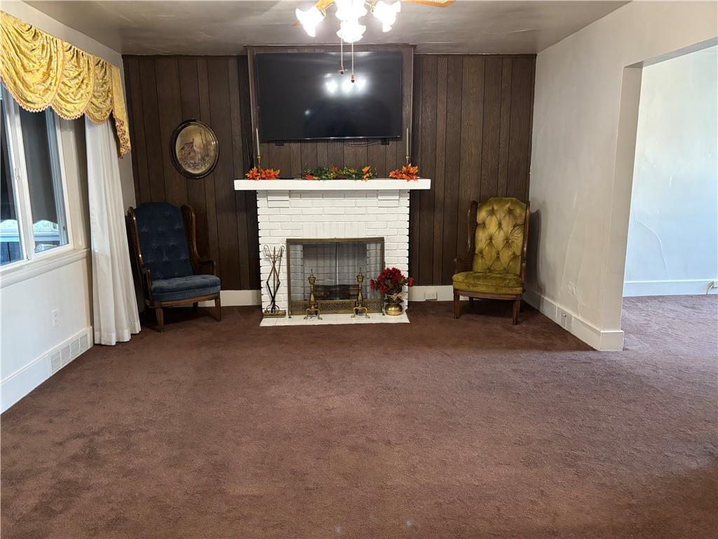 603 7th Avenue Coraopolis, PA 15108 - Photo 4 of 12 a view of livingroom with furniture and a fireplace