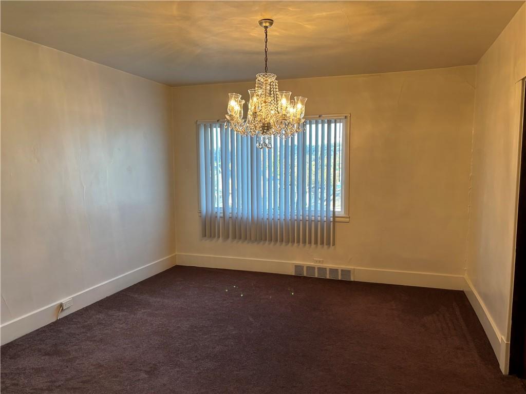 603 7th Avenue Coraopolis, PA 15108 - Photo 5 of 12 a view of an empty room with a window