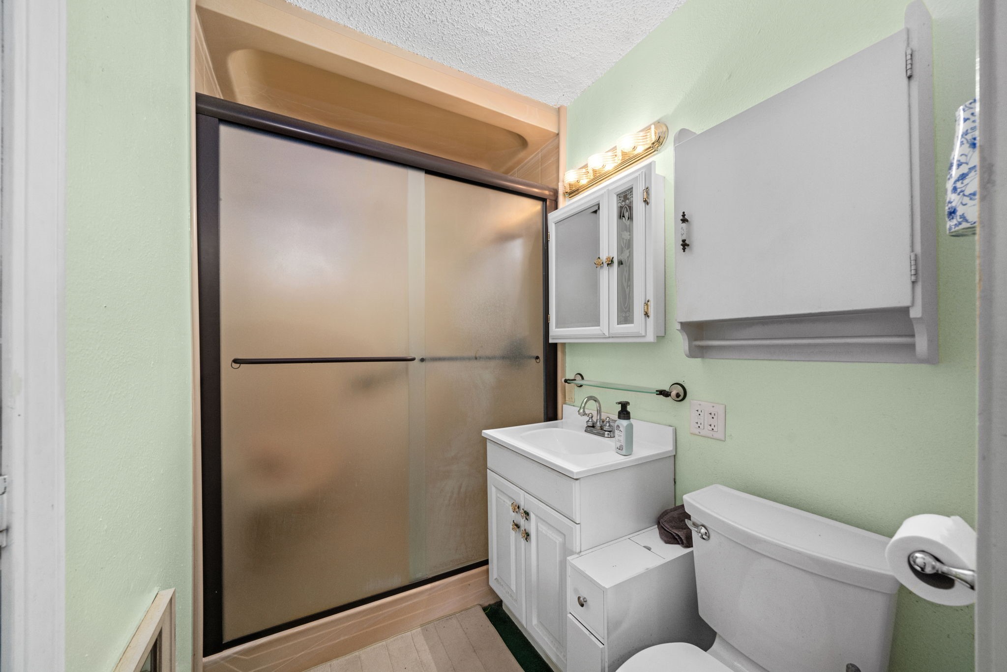 56 Wellford Street Houston, TX 77022 - Photo 20 of 26 a bathroom with a toilet sink and mirror