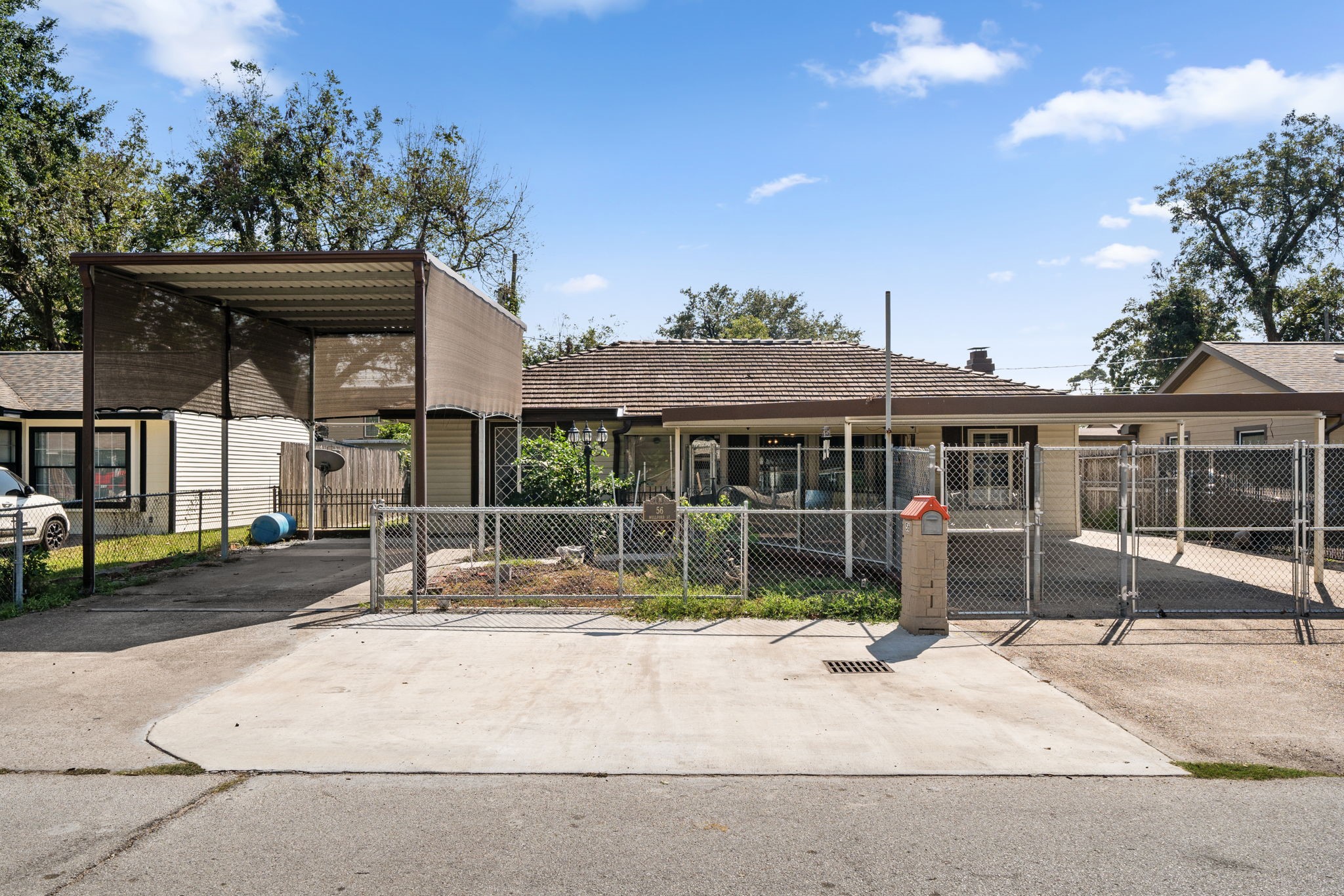 56 Wellford Street Houston, TX 77022 - Photo 2 of 26 a view of a house with a yard and sitting area
