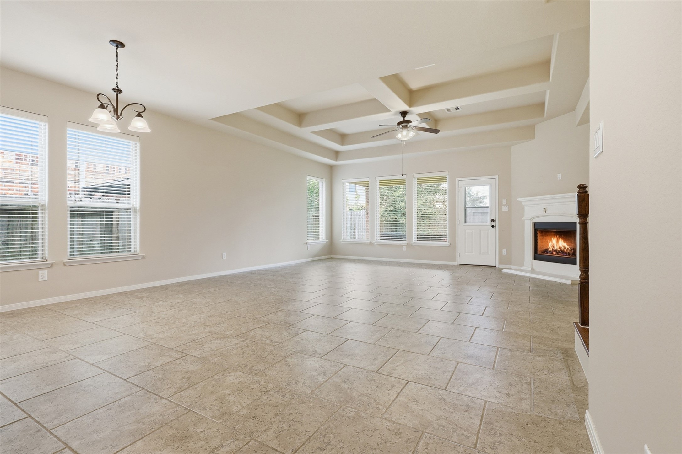 22943 Dale River Road Tomball, TX 77375 - Photo 14 of 29 a view of livingroom with hardwood floor and a ceiling fan