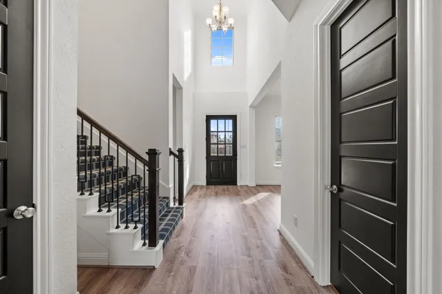 a bathroom with a sink toilet and mirror