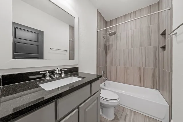 a view of a storage and utility room with sink