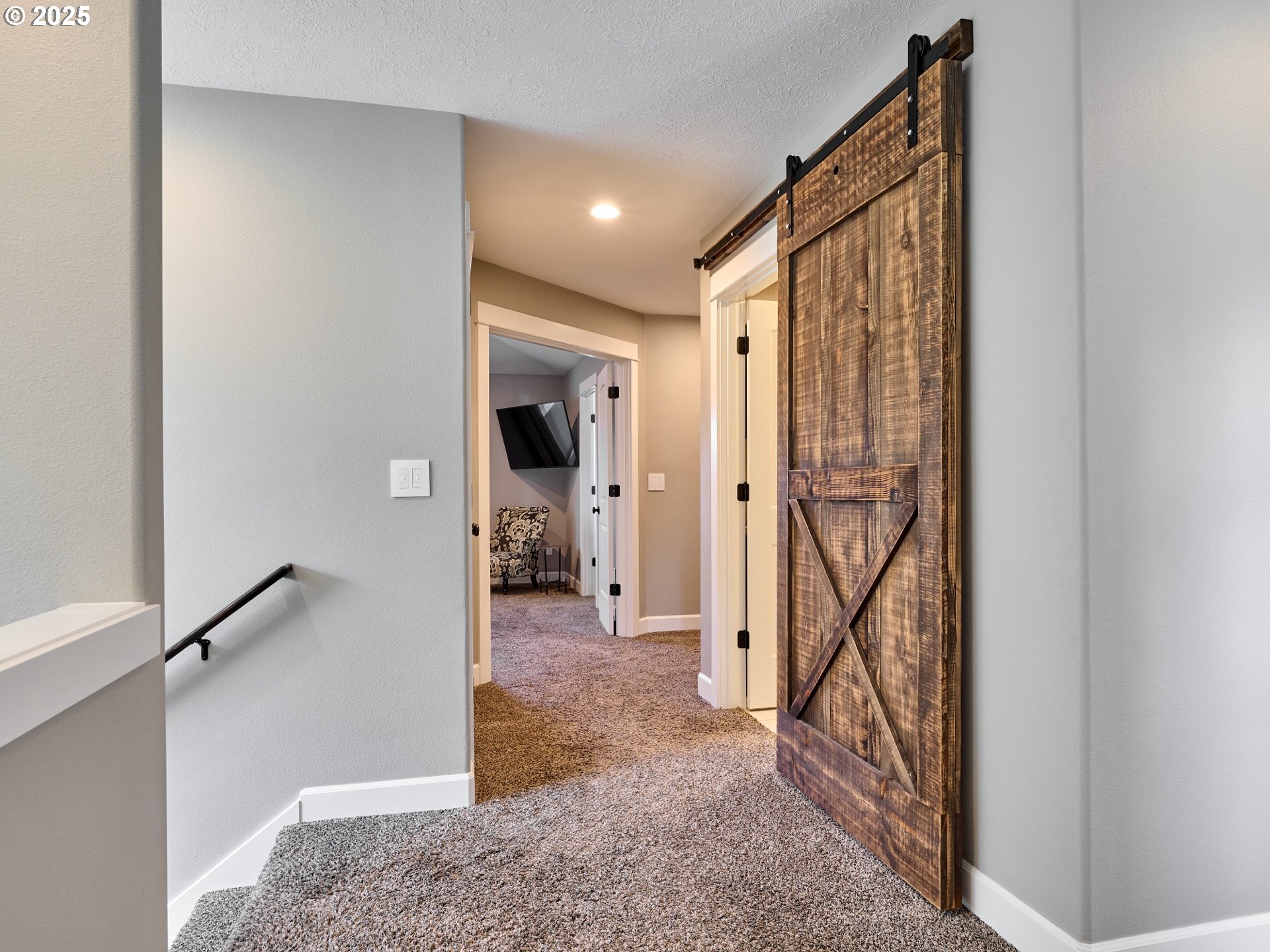 3035 Elliot Street Northwest Salem, OR 97304 - Photo 20 of 46 a view of a hallway with closet and a couch