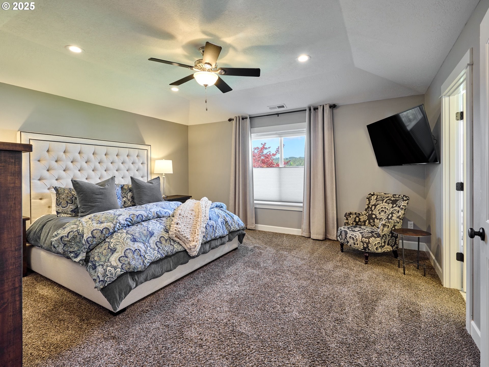 3035 Elliot Street Northwest Salem, OR 97304 - Photo 24 of 46 a bedroom with bed and a chandelier