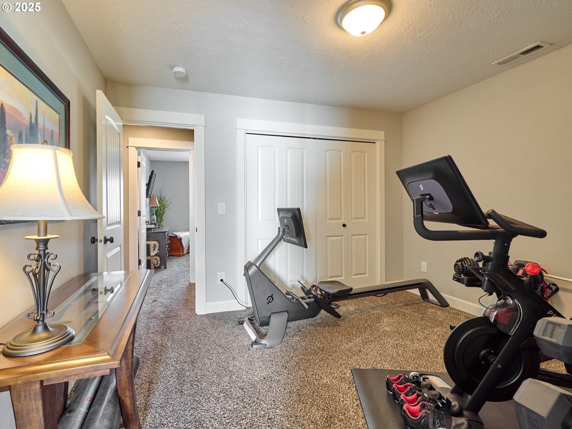3035 Elliot Street Northwest Salem, OR 97304 - Photo 31 of 46 a room with gym equipment and view of living room