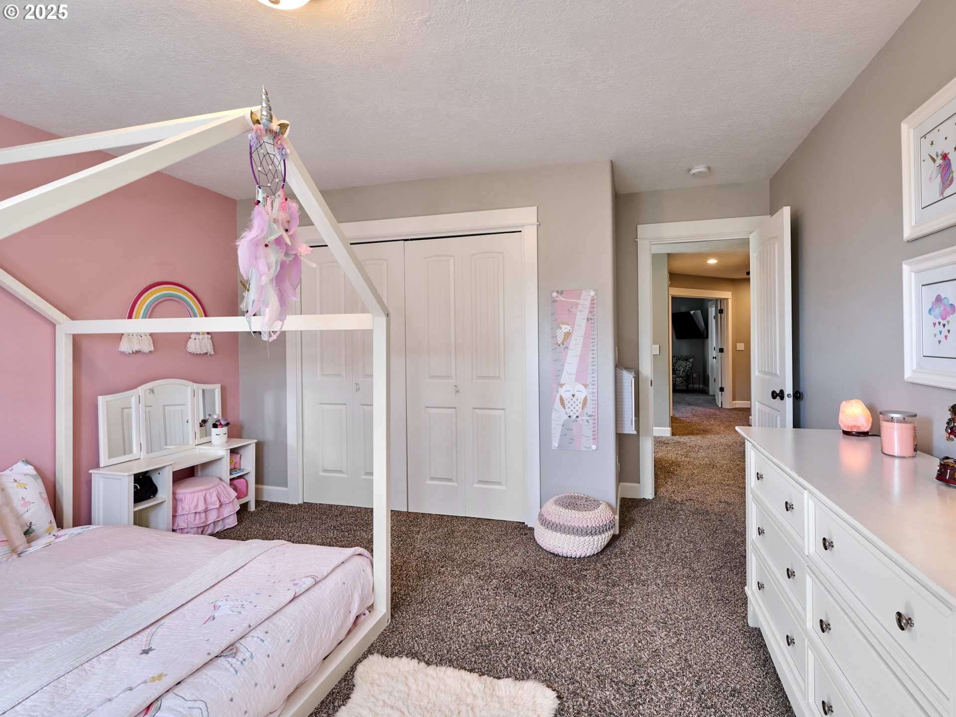 3035 Elliot Street Northwest Salem, OR 97304 - Photo 35 of 46 a bedroom with a bed and a chandelier