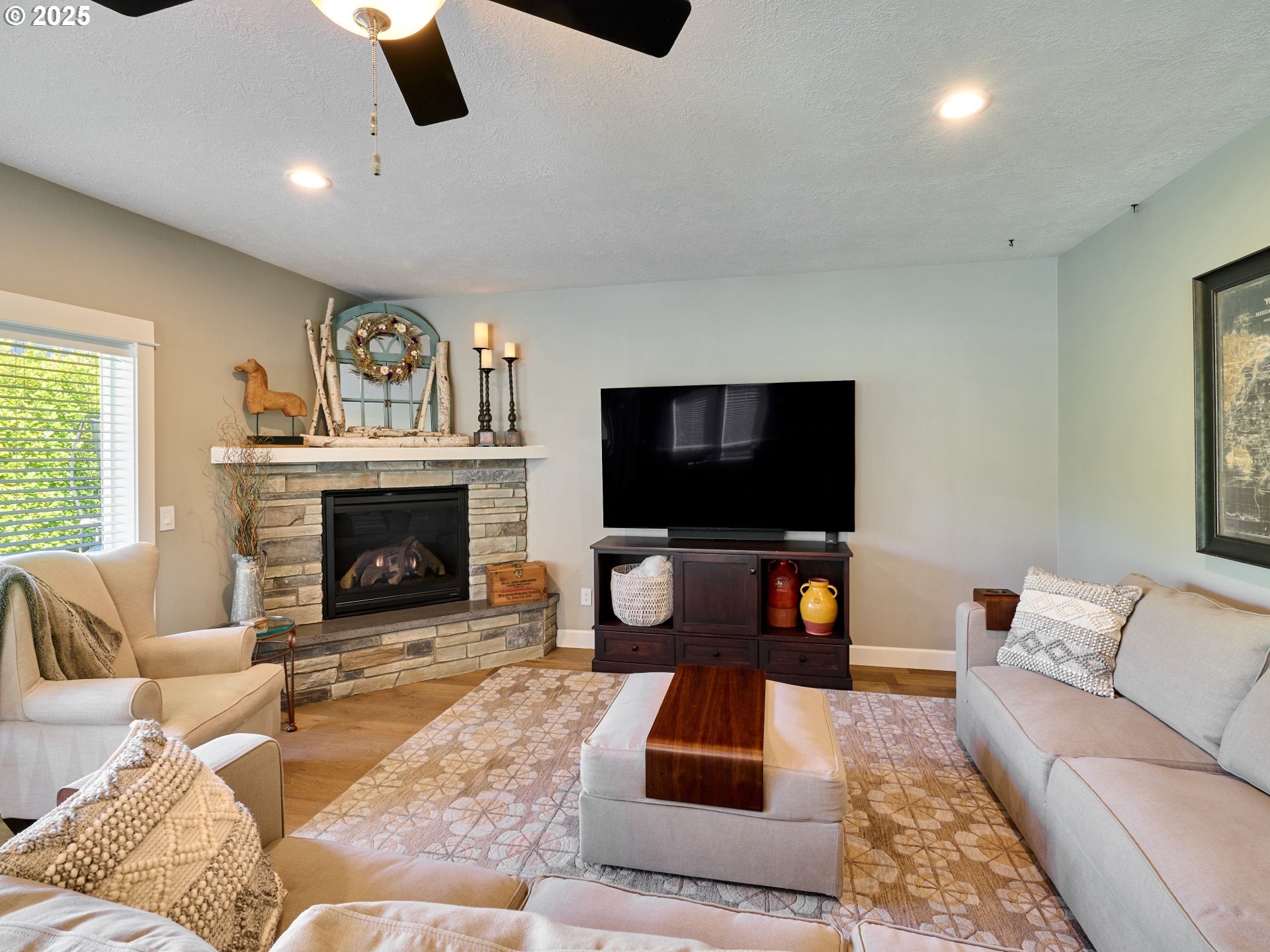 3035 Elliot Street Northwest Salem, OR 97304 - Photo 7 of 46 a living room with furniture and a flat screen tv