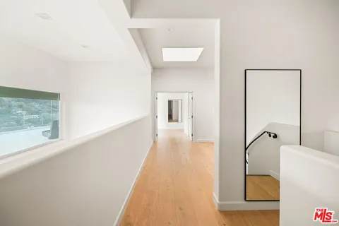 a picture of a bathroom with a bathtub