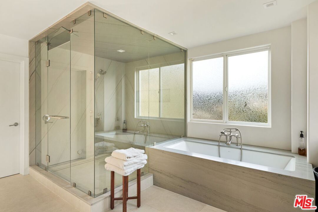7868 Electra Drive Los Angeles, CA 90046 - Photo 23 of 42 a bathroom with a bathtub and a sink