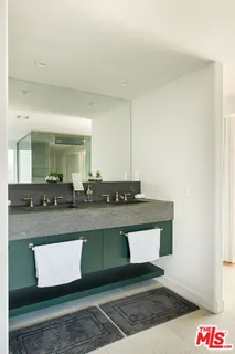 a view of living room with granite countertop and couch