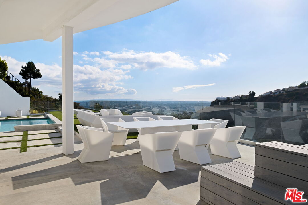 7868 Electra Drive Los Angeles, CA 90046 - Photo 34 of 42 a terrace of a house with outdoor seating