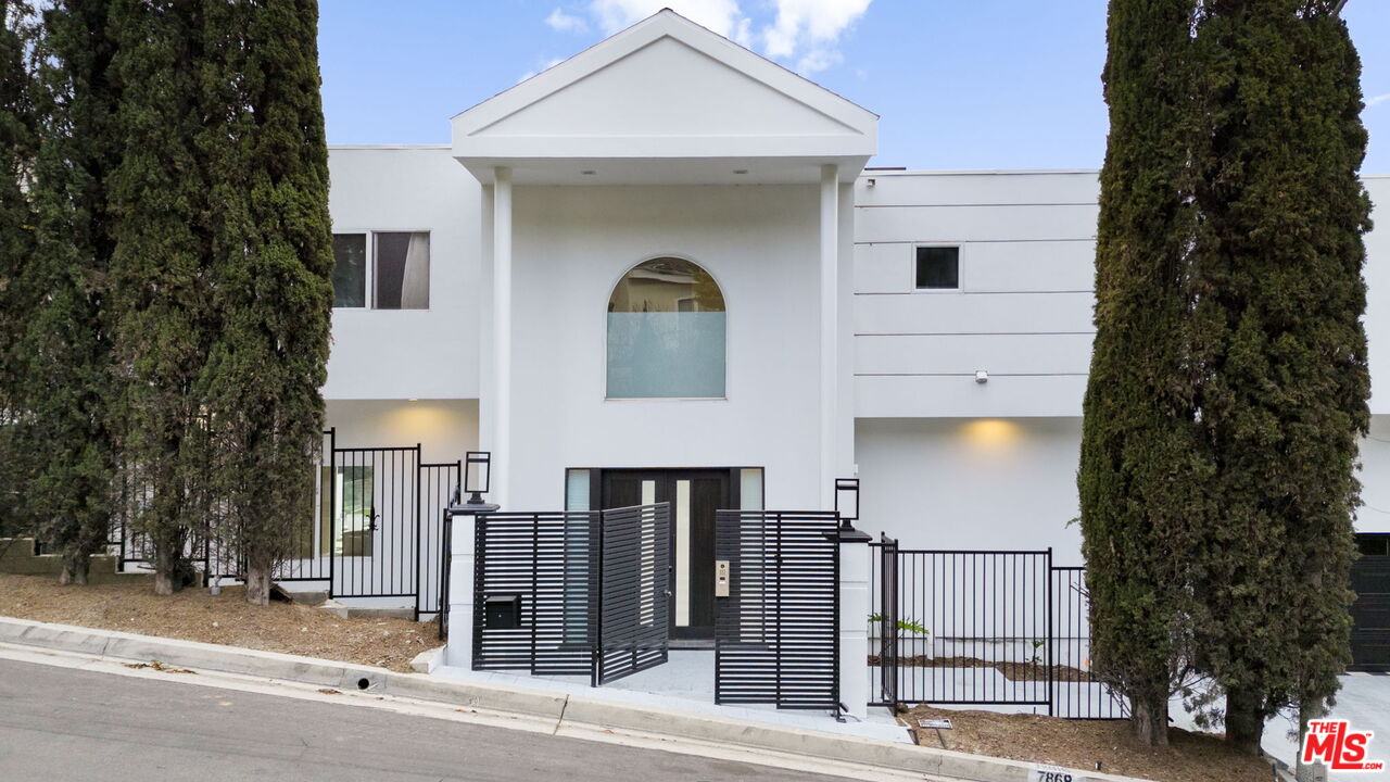 7868 Electra Drive Los Angeles, CA 90046 - Photo 39 of 42 a front view of a building with parking