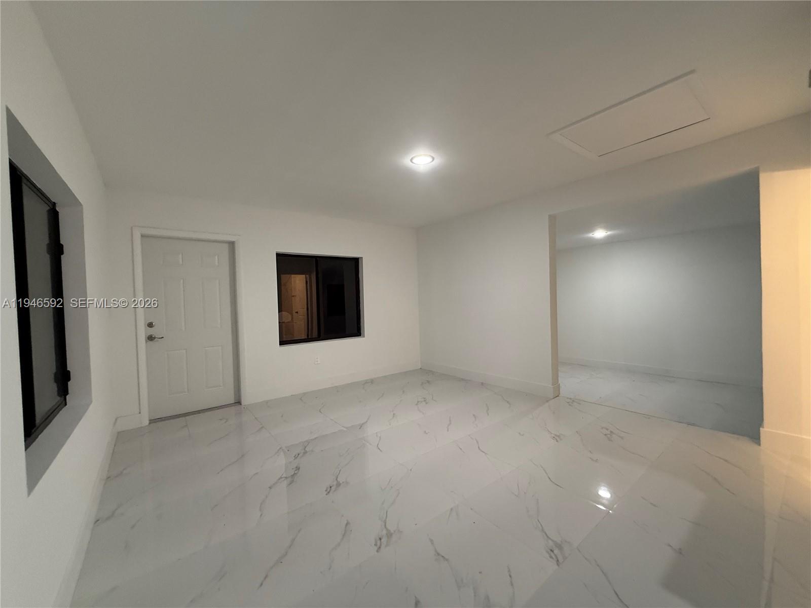 450 Beacom Boulevard, Unit C Miami, FL 33135 - Photo 5 of 9 a view of an empty room