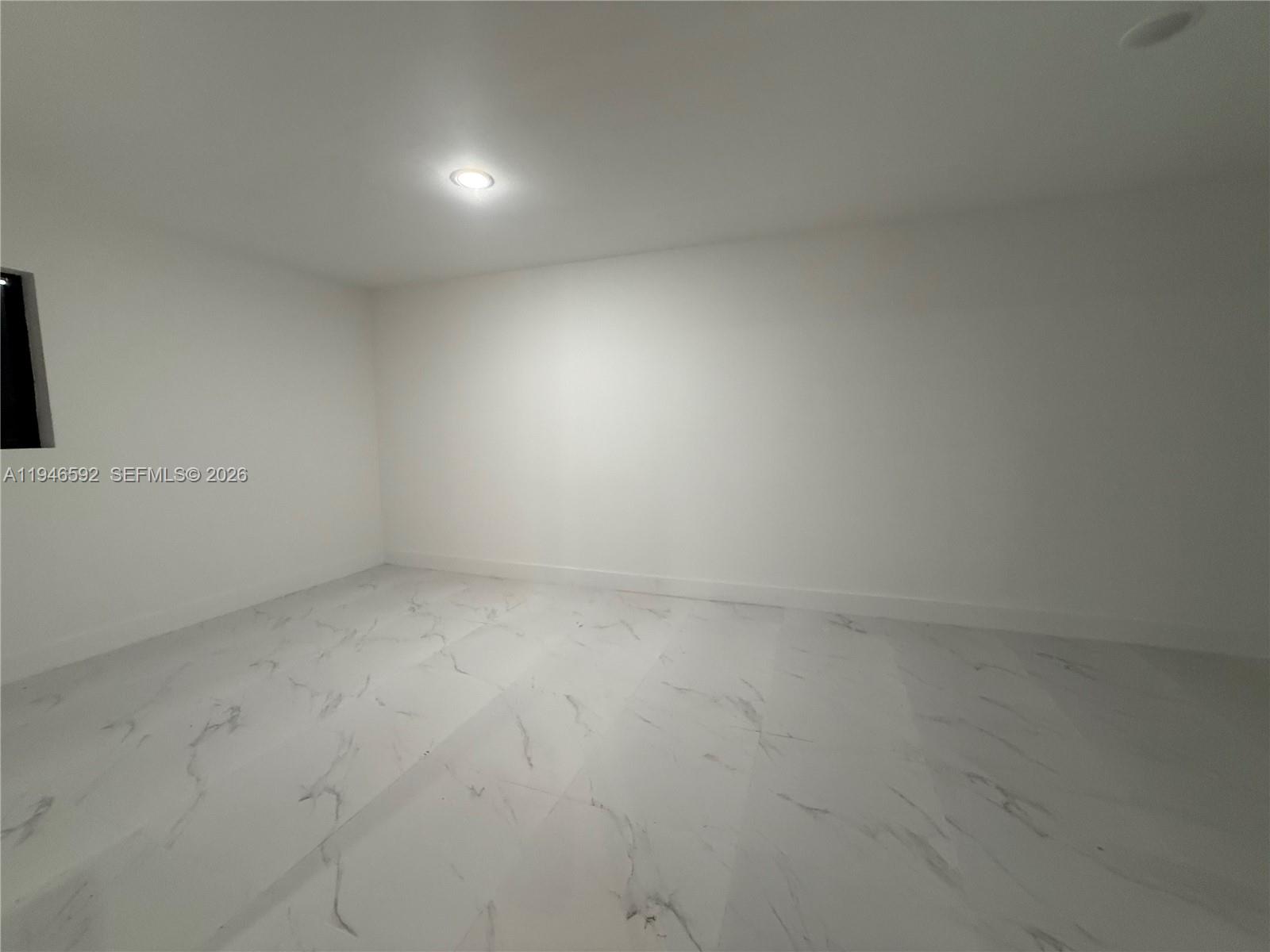 450 Beacom Boulevard, Unit C Miami, FL 33135 - Photo 6 of 9 a view of an empty room