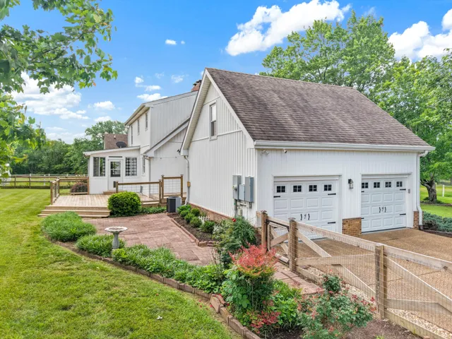 a house view with a garden space