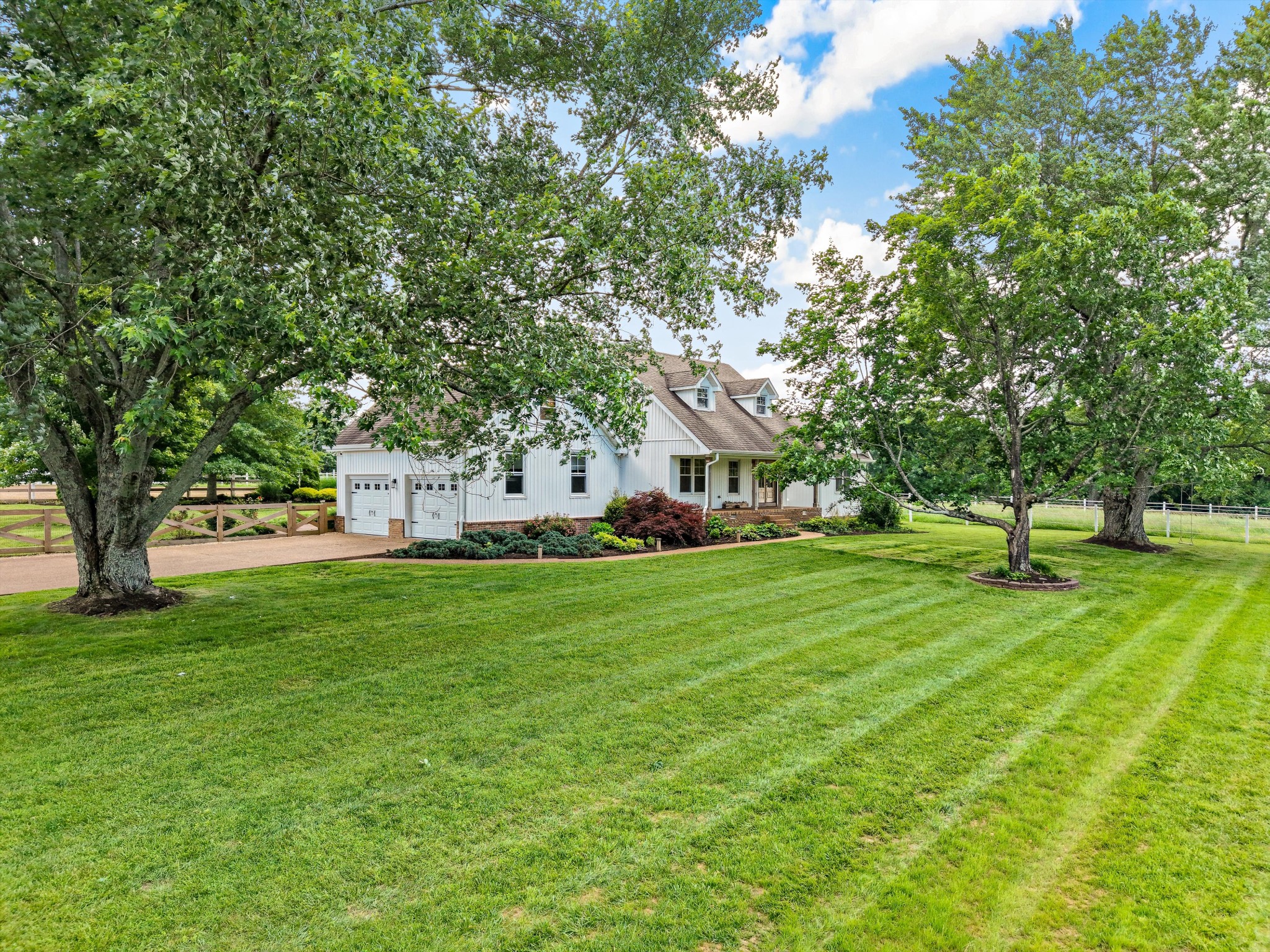 1967 Liebengood Road Goodlettsville, TN 37072 - Photo 2 of 57 a front view of a house with a yard