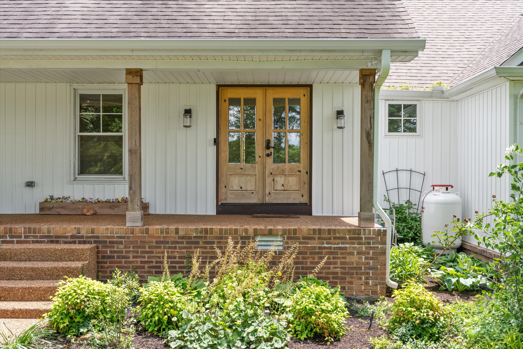 1967 Liebengood Road Goodlettsville, TN 37072 - Photo 26 of 57 a front view of a house with garden