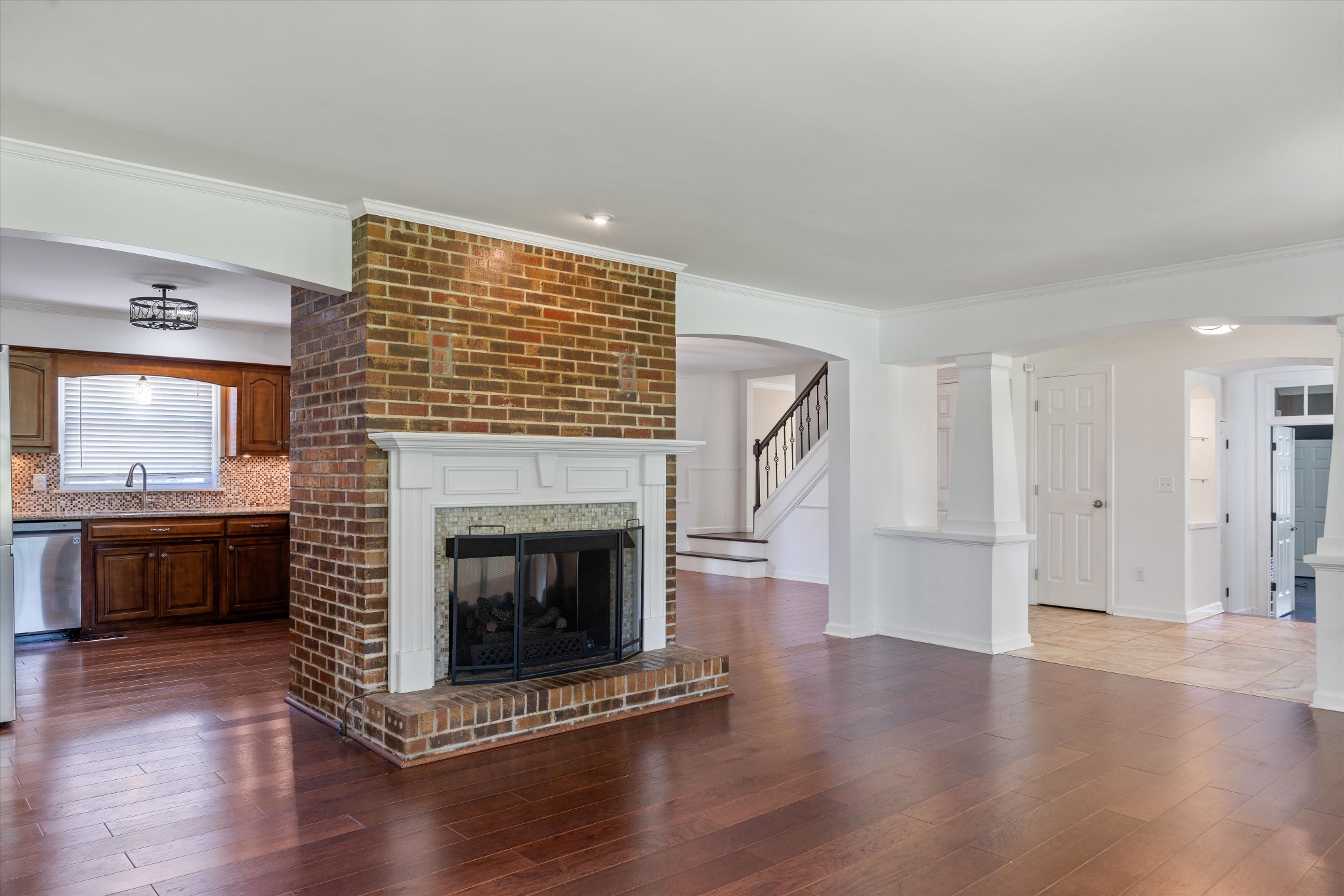 1967 Liebengood Road Goodlettsville, TN 37072 - Photo 31 of 57 a living room with wooden floors and a fireplace