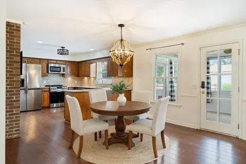 a view of entryway with wooden floor