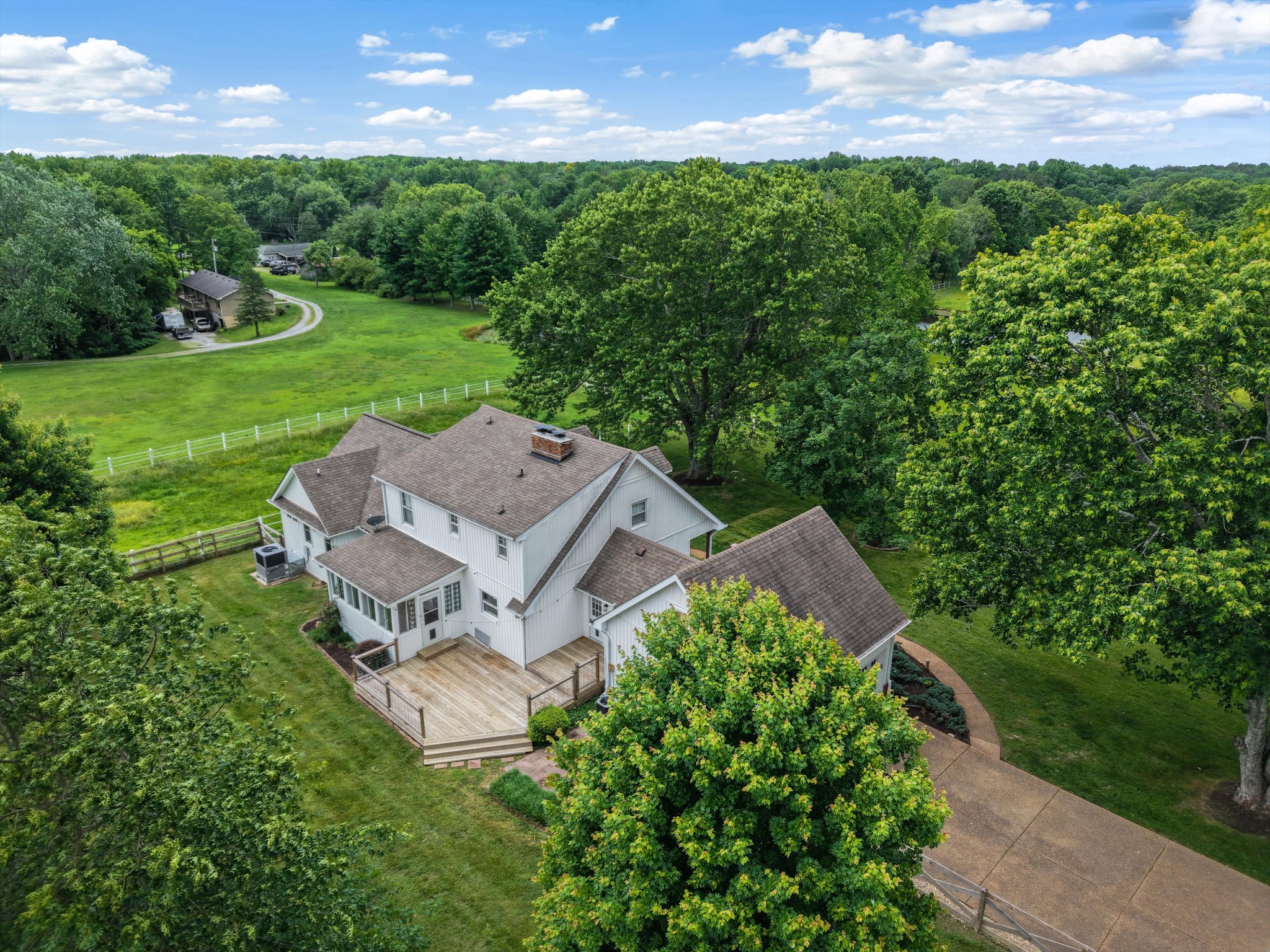 1967 Liebengood Road Goodlettsville, TN 37072 - Photo 4 of 57 an aerial view of a house with a garden and yard